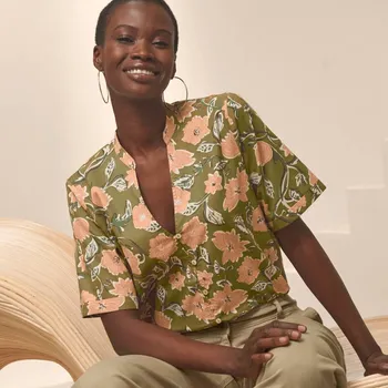 Dámská halenka Halenka s potiskem, krátkými rukávy a tuniským výstřihem šafránová/broskvová 36