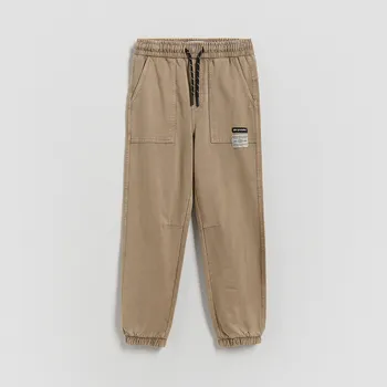 Dětská móda Reserved - Joggery se sepraným efektem - zelená - 397HK-87X - 397HK-87X-164