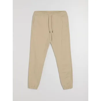 Pánské kalhoty Sinsay - Bavlněné kalhoty Jogger - béžová - 519HS-08X - 519HS-08X-36