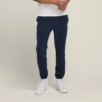 Pánské kalhoty Wilson M Team Pant Classic Navy Oblečení pánské: L