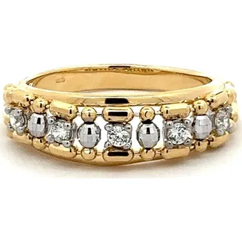 Prsten Zlatý prsten s jemným zdobením a čirými zirkony