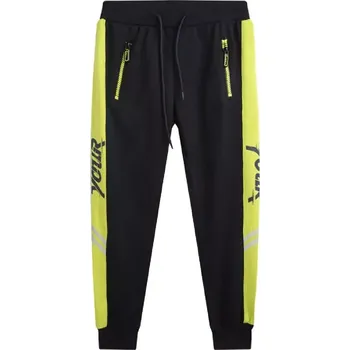 Chlapecké tepláky Kugo MT1613 tm. modré / zelený pruh