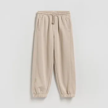 Dětská móda Reserved - Bavlněné jogger kalhoty - tělová - 396HK-02X - 396HK-02X-128