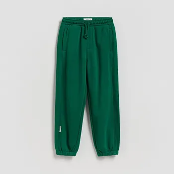 Dětská móda Reserved - Bavlněné jogger kalhoty - svěží zelená - 396HK-76X - 396HK-76X-116