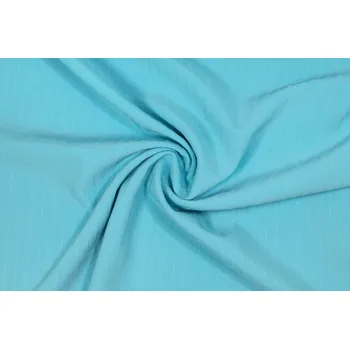 Kostýmovka bledě modrá s plastickými proužky