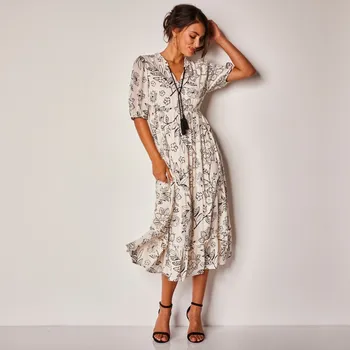 Dámské šaty Kreponové midi šaty s potiskem květin režná/černá 36