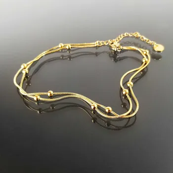 Řetízek Dvojitý řetízek na nohu s kuličkami z pozlacené oceli č. 1317