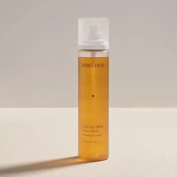 Rozjasňující toner s Niaciamidem - Rebecoco Golden Drip Phyto-Thera Toning Essence