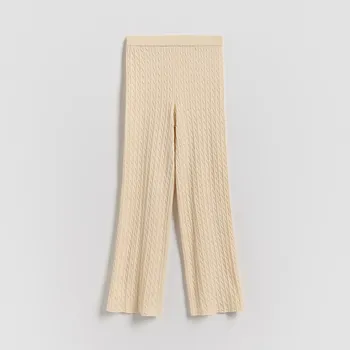 Dětská móda Reserved - Žerzejové kalhoty flare - krémová - 809IE-01X - 809IE-01X-122