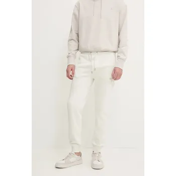 Tepláky Calvin Klein Jeans J30J325658 béžová 01X, vel. XXL