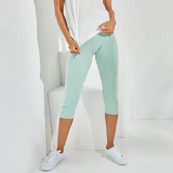 Dámská móda 3/4 žerzejové legíny světle zelená 54