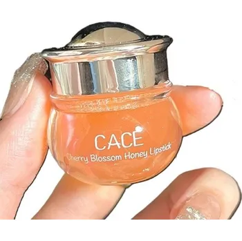 Péče o rty Vyživující balzám na rty Vzhled medu Skleněná dóza s lžičkou Hydratační balzám jako podklad pod rtěnku i samostatné použití 2