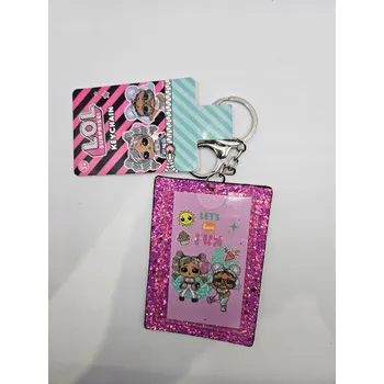 L.O.L. SURPRISE PŘÍVĚSEK NA KLÍČE BROKÁTOVÁ PANENKA OBRÁZEK