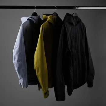 QUECHUA Pánská turistická nepromokavá bunda MH 900 S ZELENÁ|ČERNÁ