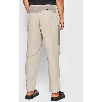 New Balance Kalhoty z materiálu MP21502 Béžová Relaxed Fit XXL