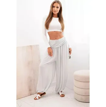 Dámské kalhoty Dámské viskózové kalhoty s širokými nohavicemi a volánky šedý UNI