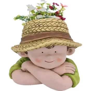 Zahradní dekorace Chlapec s květináčem UA16-23501