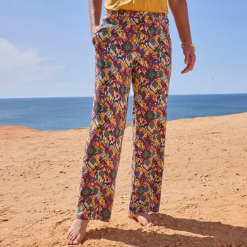 Dámské kalhoty Široké kalhoty s pružným pasem a potiskem purpurová/mangová 46