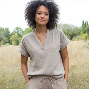 Mušelínová jednobarevná halenka s tuniským výstřihem béžová 50