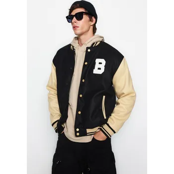 Dámský kabát Trendyol černý unisex pravidelný střih bomber límec vysokoškolský kabát Trendyol černá 2335360