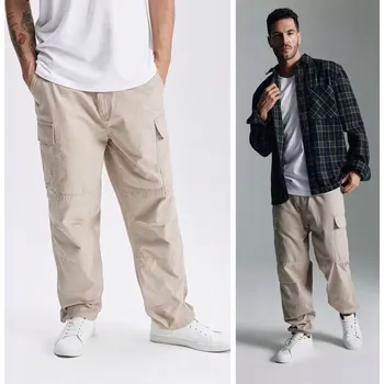 Pánské kalhoty Diverse pánské tepláky béžové barvy velikost 33