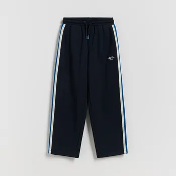 Dětská móda Reserved - Bavlněné kalhoty - tmavomodrá - 421HK-59X - 421HK-59X-140