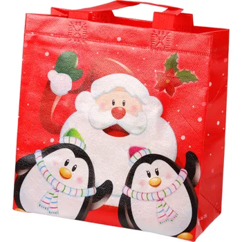 Dětský pokoj Mamido Vánoční dárková taška Santa Klaus a tučňáčci 22cm x 22cm x 11cm červená