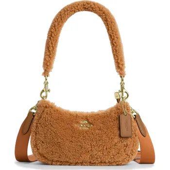 Módní doplněk COACH Kabelka Teri Mini Crossbody Bag In Shearling Gold Dark Natural Honey Brown
