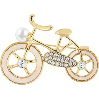 Brož Brož - jízdní kolo ozdobené bílou perletí a zirkony, zlaté barvy