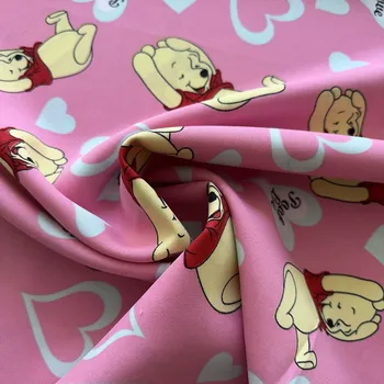 Dekorační polyesterová látka, medvídek Pú na růžové