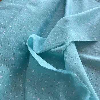 Lehoučký tyrkysový popelín hvězdičky a ažura