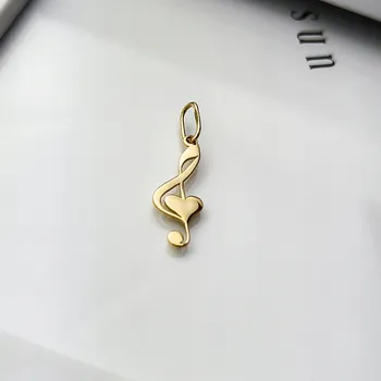 Přívěsek Zlatý přívěsek houslový klíč se srdíčkem - au. 585