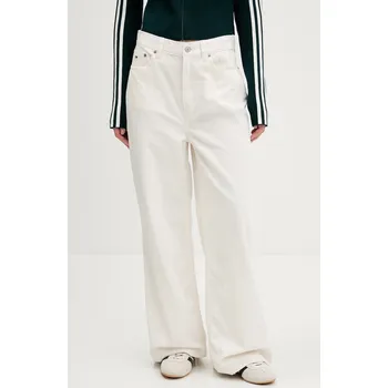 Dámské kalhoty Manšestrové kalhoty Tommy Jeans DW0DW21700 bílá 00X, vel. 30/32