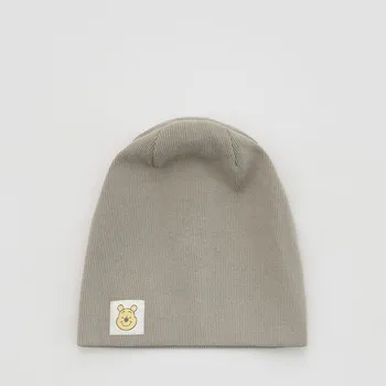 Kojenecké oblečení Reserved - Žerzejová čepice Winnie the Pooh - světle šedá - 971IQ-09X - 971IQ-09X-R36