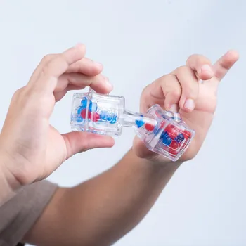 Dřevěná hračka Fidget Blox Sound - relaxačná kocka - modrá a červená