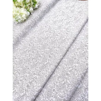 Látka 100% bavlna - kytičky krajkové hnědé na bílé