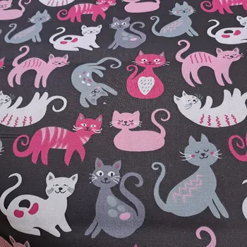 Pro útulný domov bavlněná látka KOČKY NA ČERNÉ