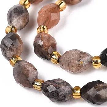 Drahý kámen Sluneční kámen tmavý, oválky broušené, 8-9x6-8 mm, půlšňůra 19 cm (cca 18 korálků)
