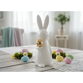 Velikonoční dekorace Velikonoční keramická figurka MERIN zajíček se zlatým vajíčkem 21x8 cm 845159