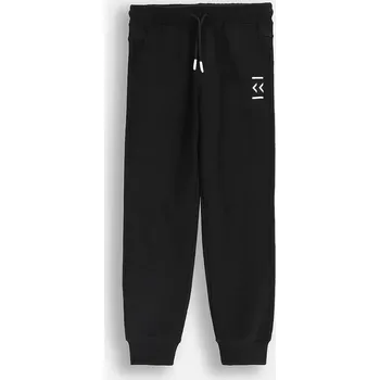 Chlapecké kalhoty Dětské bavlněné tepláky Coccodrillo ZC5120101VBA černá 99X, vel. 122