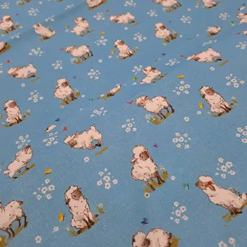 Pro útulný domov bavlněná látka velikonoční OVEČKY na modré