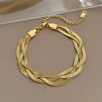 Náramek Dámský náramek z chirurgické oceli Twist Deluxe zlatý