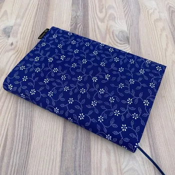 Obal na knihu Obal na knihu Bílé kytičky na modré, UNI XS