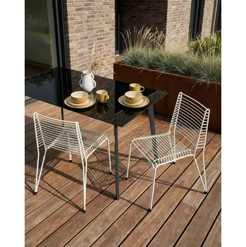 Sada 2 zahradních židlí bílá ocelový rám stohovatelné venkovní terasa moderní zahrada Beliani