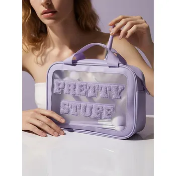 Kosmetická taška Sinsay - Kosmetická taštička se strukturovaným nápisem - levandulová - 565GX-04X - 565GX-04X-ONE