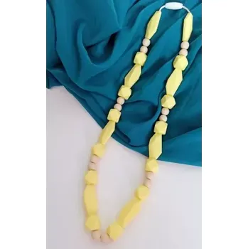 Přebalovací podložka MIMIKOI - Kojící korále hravé tvary žluté