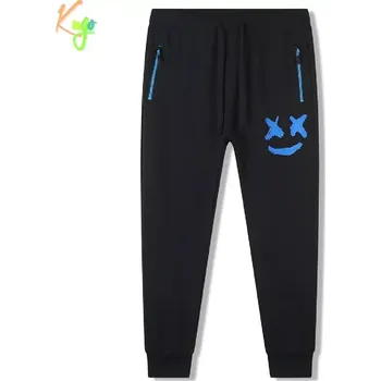 Chlapecké tepláky Kugo FT7053 černé / modrá aplikace