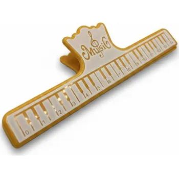 Klip na úchyt not na stojanu - žlutá barva