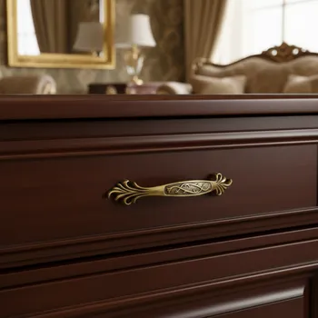 Nábytkové kování Interex design Úchytka KAMILA / Staromosaz 96 mm