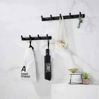 Věšák Nástěnný věšák FEZ černý, loftový, kovový, geometrický držák na ručníky